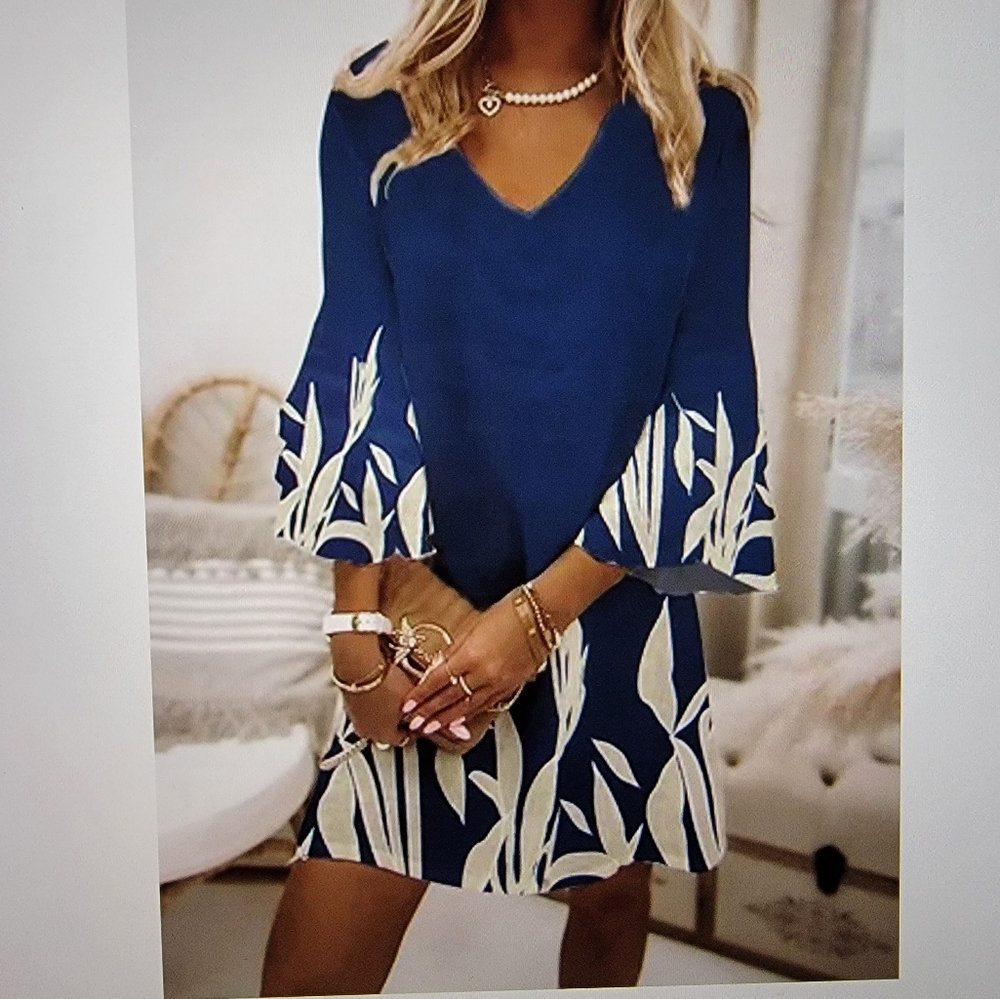 V neck light summer dress. Blue and white